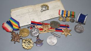 A WWI medal trio awarded to J. 11048 F. P. SHARMAN. A.B. R.N., a George V Royal Navy long service