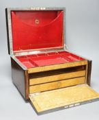 A Victorian rosewood stationery box, with red Morocco interior, by S Woodfield, 21 high x 35cms