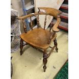 A Victorian beech and elm smoker's bow chair