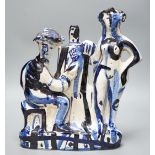After Picasso, a tin-glazed blue and white figural studio pottery group of an artist and their muse,
