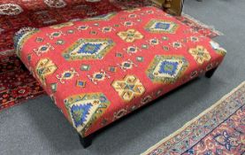 A large rectangular Kilim fabric footstool, length 123cm, depth 82cm, height 26cm