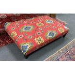 A large rectangular Kilim fabric footstool, length 123cm, depth 82cm, height 26cm