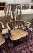 A Victorian elm and beech Windsor armchair, width 56cm, depth 38cm, height 108cm