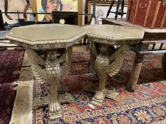 A pair of Empire style octagonal wooden centre tables with winged griffin supports, width 60cm,