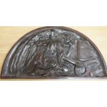A demi-lune cast bronze panel depicting a weeping angel, signed DEBO, 49.5 x 26.5cm