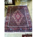 A North West Persian blue ground rug, 150 x 120cm