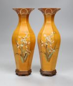 A pair of Chinese bamboo veneer vases, on stands, 20cm high