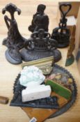 Eight cast iron door stops, a brass lion, a tray, two panels and two floral plaster models, (13)