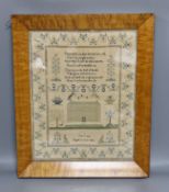 An early Victorian sampler, dated 1841 by Ann Case, embroidered with a house, trees, a dog and