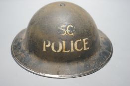 A WW2 period steel Special Constable police helmet, stamped HBH 1938