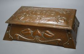 An Art Nouveau copper Cigars box. J.F. Pool of Hayle, 29cms wide x 19cms deep