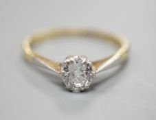 An 18ct gold and platinum solitaire diamond ring, the brilliant cut stone approximately 0.35cts,