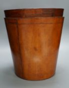 Two leather waste paper bins, 30cms high,