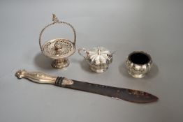 A white metal handled tortoiseshell paper knife and sundry small silver items, including an