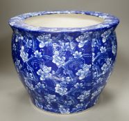 A blue and white ceramic jardiniere, pseudo mark, 27cm high.