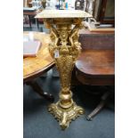 A Neo Classical style gilt spelter pedestal, cast with female busts and oval cartouche, height