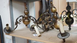 A pair of brass two branch sconces, 33cms high