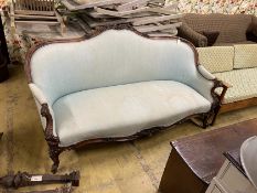 A Victorian carved rosewood upholstered settee, width 174cm, depth 68cm, height 90cm