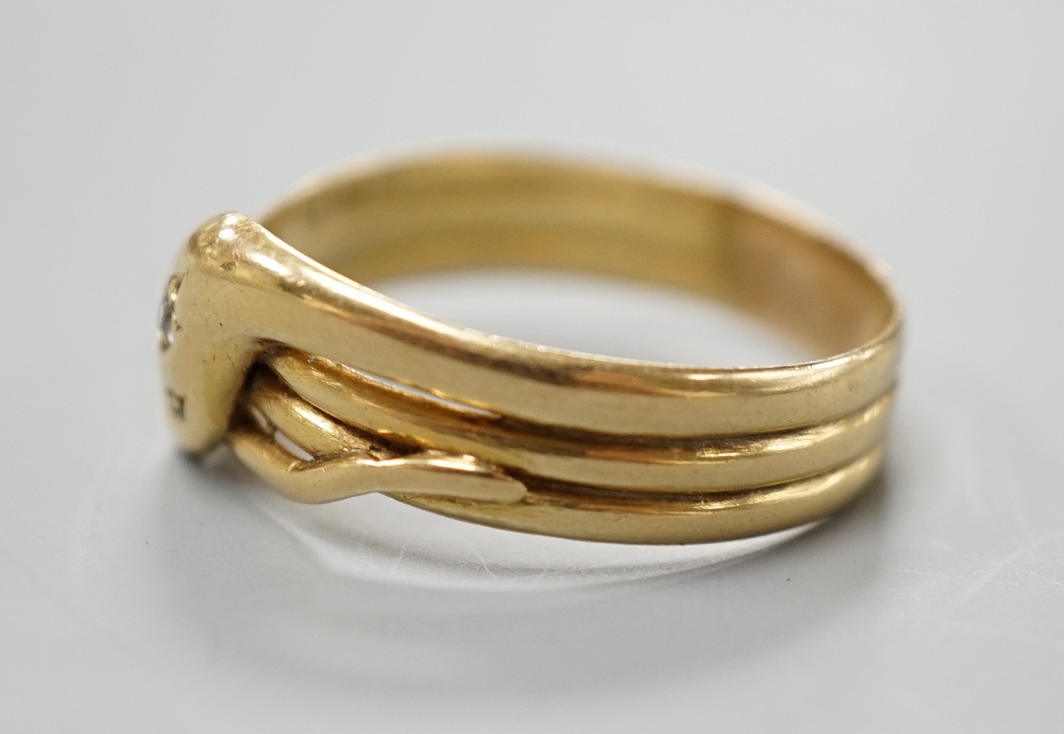 An Edwardian 18ct gold and diamond chip set serpent ring, size X/Y, gross 5.6 grams. - Image 3 of 5