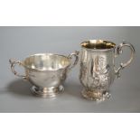 A Victorian embossed silver christening cup, Edward & John Barnard, London, 1848, 11cm and a