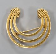 A continental 750 yellow metal concentric crescent brooch, 35mm, 7 grams.