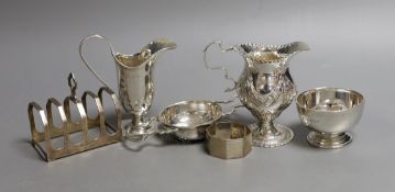 Two late Victorian silver cream jugs, including inverted pear shape, London, 1897, 96mm, a later