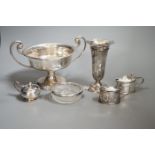 A group of assorted small silver items to include a posy vase, silver-mounted cut glass quaich, a