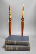 A pair of hexagonal fruitwood candlesticks with chinoiserie faux candles and two volumes on Japanese