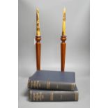 A pair of hexagonal fruitwood candlesticks with chinoiserie faux candles and two volumes on Japanese