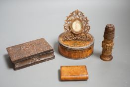 A 19th century circular white metal mounted burr wood snuff box and assorted small carvings