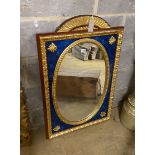 An Empire style painted gilt and faux malachite wall mirror, width 60cm, height 93cm