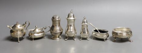 Seven assorted 20th century silver condiments including pepperettes and mustards.