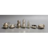 Seven assorted 20th century silver condiments including pepperettes and mustards.