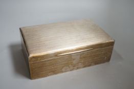 A George V engine turned silver mounted rectangular cigar/cigarette box, with interior