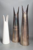A Sophie Suchodolski ceramic vase and a pair of matching steel vases. Tallest 52cm