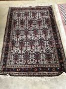 A North West Persian blue ground rug, 153 x 106cm