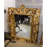 A 20th century Florentine style gilt wood mirror, width 86cm, height 115cm