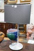 A Bang & Olufsen convex music centre on raised stand, 86 cms high,