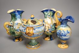 A pair of Cantagalli maiolica vases, a Cantagalli maiolica ewer and a similar potpourri. Tallest