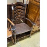 A 19th century ash and elm ladder back rocking elbow chair, width 66cm, depth 40cm