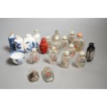 A collection of 20th century Chinese export reverse painted snuff bottles with associated blue and