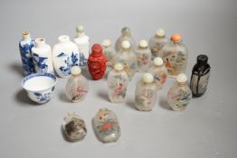 A collection of 20th century Chinese export reverse painted snuff bottles with associated blue and