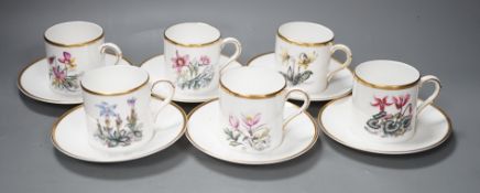 A boxed Royal Worcester coffee cans and saucers for six