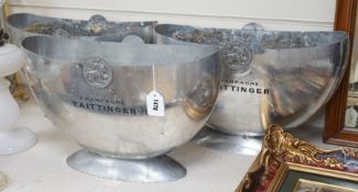 Three champagne Taittinger pewter wine coolers, 47cms wide x 30cms high,