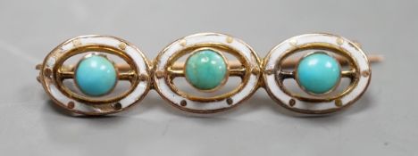 An early 20th century yellow metal, enamel and three stone turquoise set bar brooch, 29mm, gross