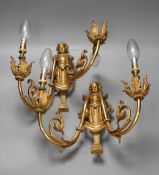A pair of Louis XVI style ormolu figural twin branch wall lights, 30cm high