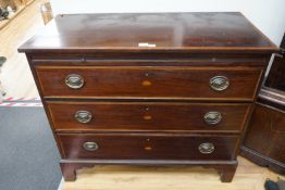 A George III inlaid mahogany three drawer chest with brushing slide, width 109cm, depth 52cm, height