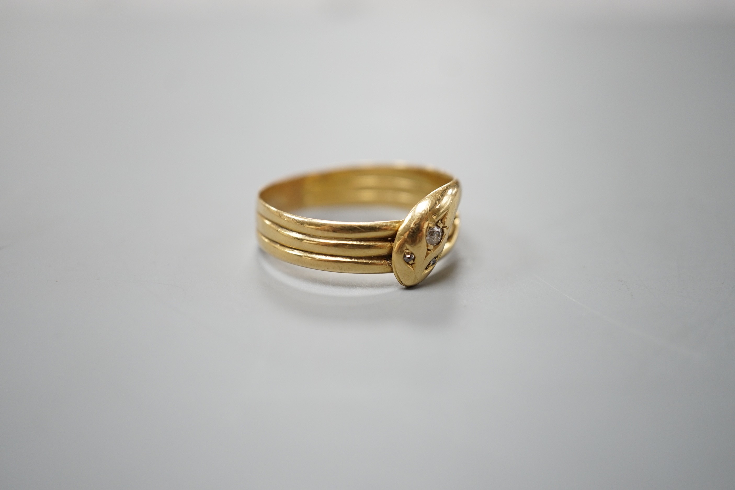 An Edwardian 18ct gold and diamond chip set serpent ring, size X/Y, gross 5.6 grams. - Image 4 of 5