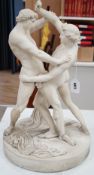 A large 19th century parian group of classical wrestlers (cracked). 55cm tall