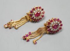 A pair of Middle Eastern yellow metal, ruby and diamond set oval cluster earrings, with detachable